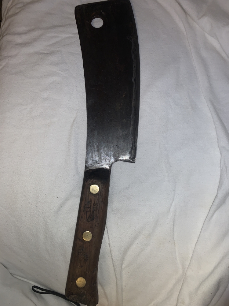 Vintage Cleaver made by Nichols Bros of Greenfield, MA. While it has no markings on the blade, the handle is stamped on both sides with “Prop Of Nichols Bros”