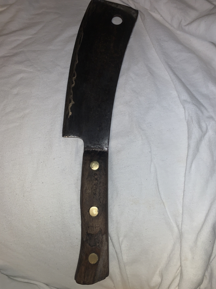 Vintage Cleaver made by Nichols Bros of Greenfield, MA. While it has no markings on the blade, the handle is stamped on both sides with “Prop Of Nichols Bros”