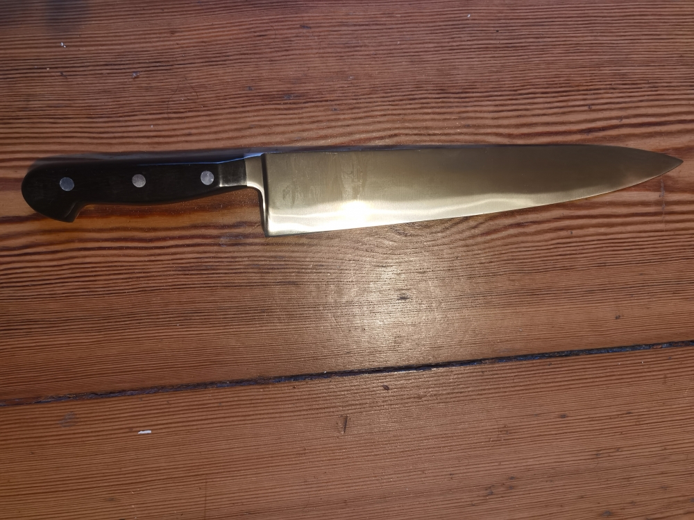  Kitchenknife, F.DICK, cranked. 26 cm, 297 gr. wooden handle, Nr.1447, Brandnew