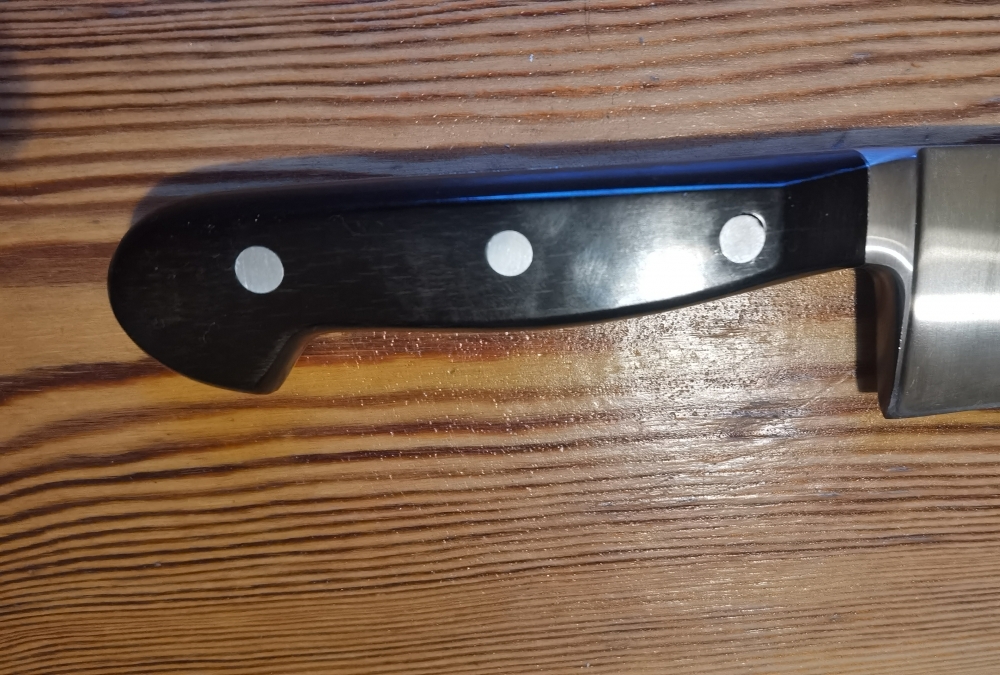  Kitchenknife, F.DICK, cranked. 26 cm, 297 gr. wooden handle, Nr.1447, Brandnew
