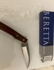 Unused discontinued Beretta Trident folding knife with African Padauk wood onlay handles - JKTRID63