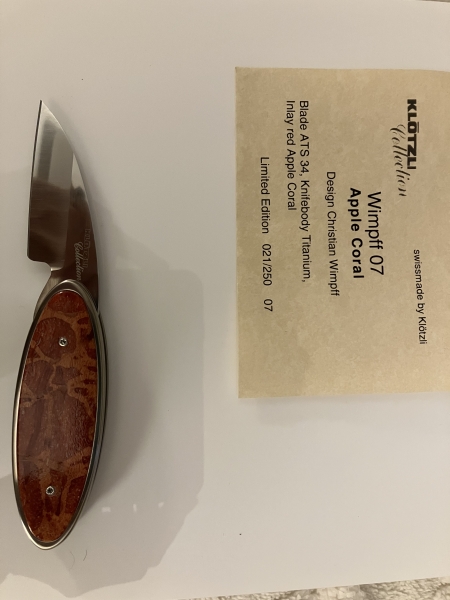 Limited Edition Klötzli Wimpff 07 folding knife with titanium knife-body and red apple coral inlay, never used or carried.