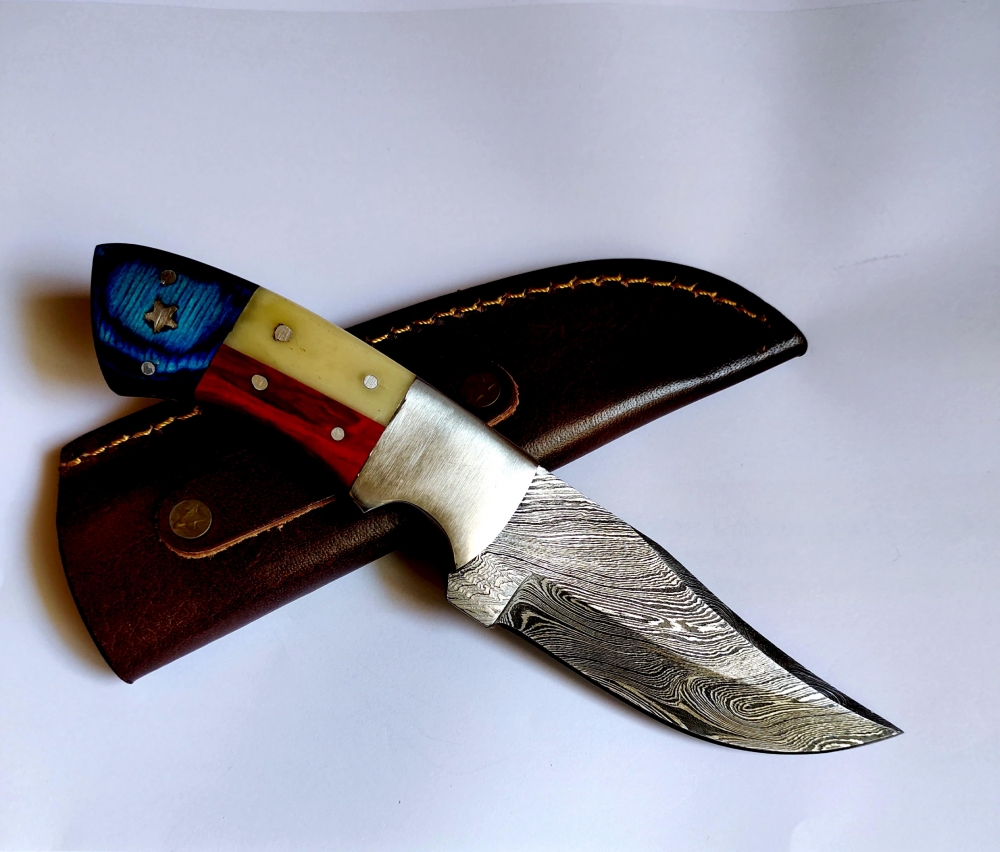 Custom Handmade 1095 and 15N20 Damascus Steel Skinner -- HRC 58 fixed blade– Patriotic Exotic Wood & Camel Bone with premium Leather sheath 