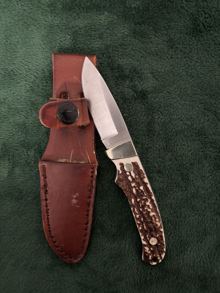 Uncle Henry/schrade 1100088 fixed blade with Staglon handle.