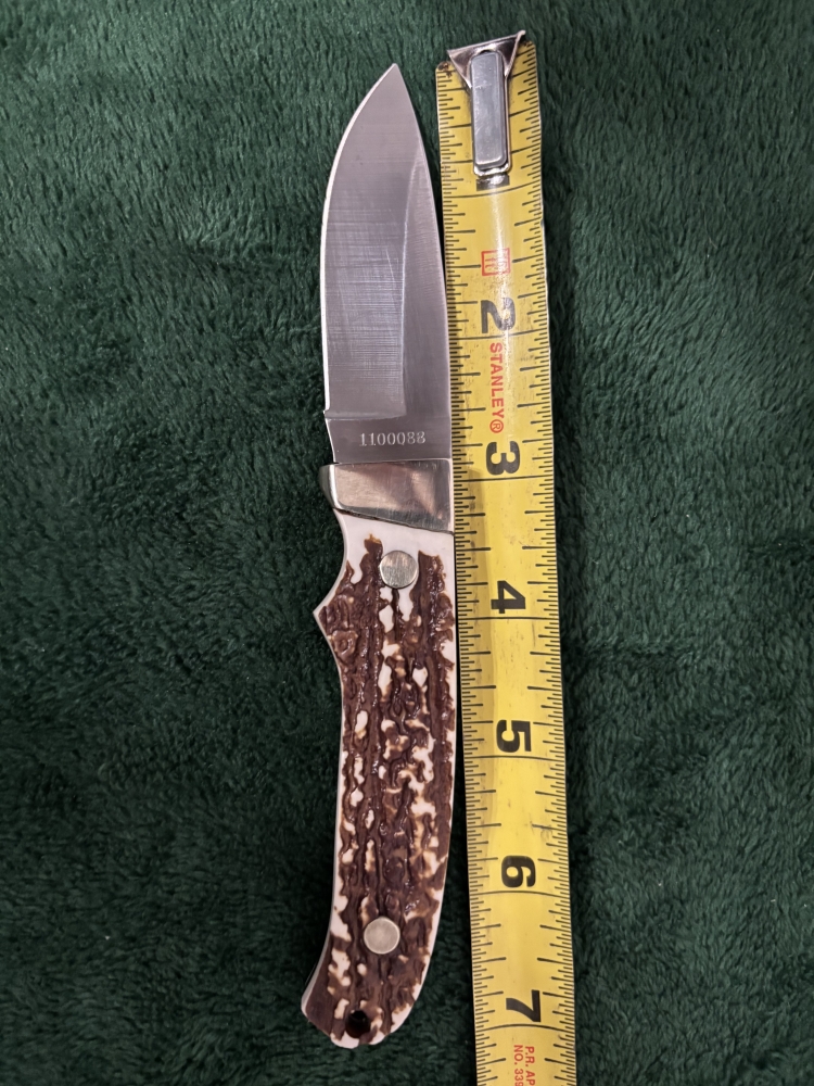 Uncle Henry/schrade 1100088 fixed blade with Staglon handle.