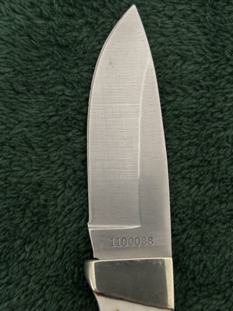 Uncle Henry/schrade 1100088 fixed blade with Staglon handle.