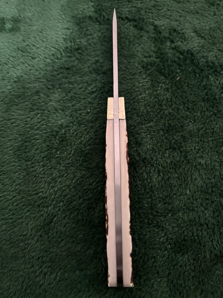 Uncle Henry/schrade 1100088 fixed blade with Staglon handle.