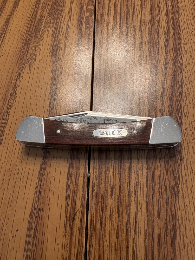 Buck Mustang 701, limited production Aurum Etch Series with original box and COA. Serial #0768