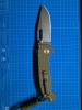 Demko AD20 clip point MagnaCut G10 OD green
