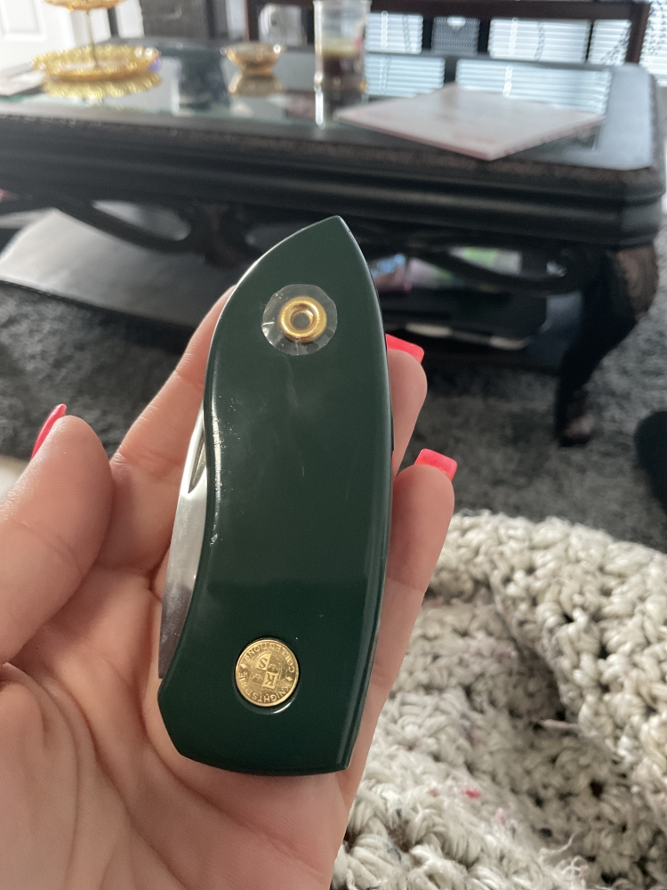 Two Franklin Mint 1970’s Playboy folding knives with nude photo 