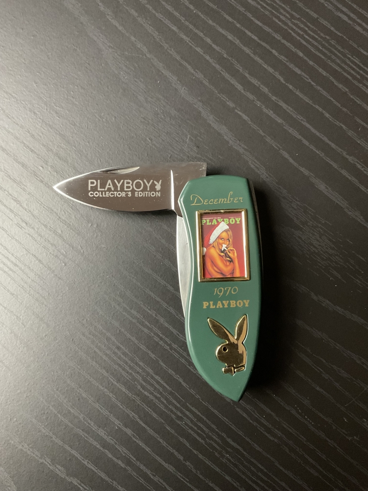 Two Franklin Mint 1970’s Playboy folding knives with nude photo 