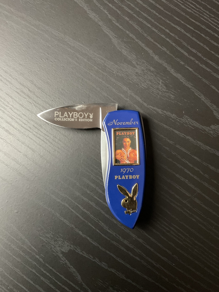 Two Franklin Mint 1970’s Playboy folding knives with nude photo 