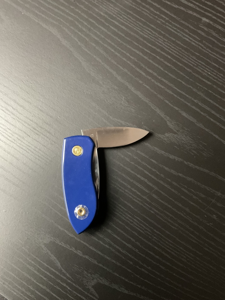 Two Franklin Mint 1970’s Playboy folding knives with nude photo 