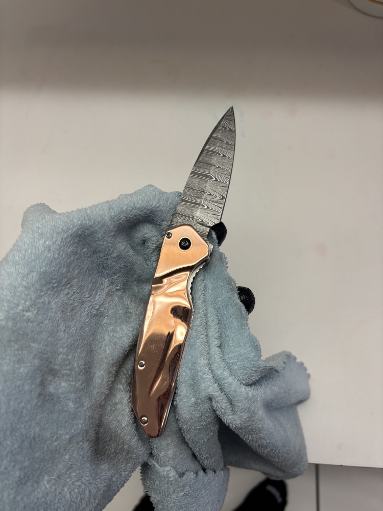 Damascus and copper liner lock custom knife 