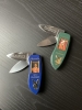 Two Franklin Mint 1970’s Playboy folding knives with nude photo 