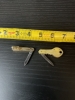 Two vintage souvenir folding knives a key and a tie clip very small