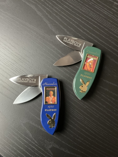 Two Franklin Mint 1970’s Playboy folding knives with nude photo 