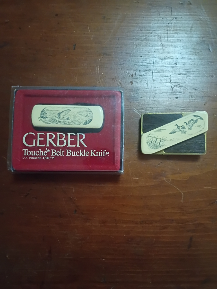 Pair Vintage Gerber Touche Belt Buckle Knives 