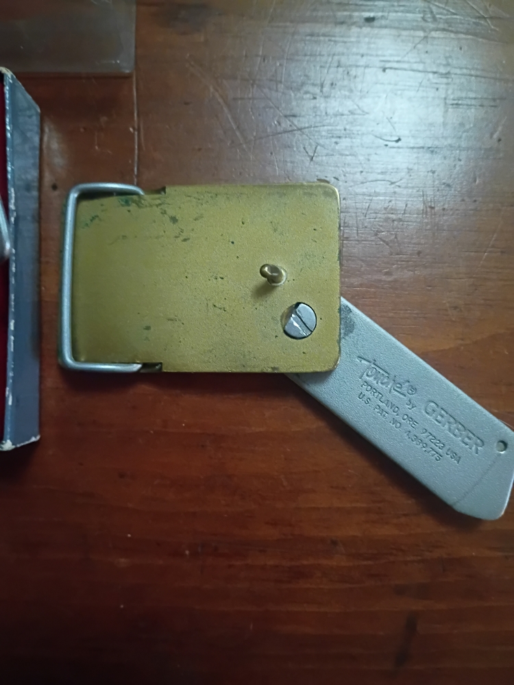 Pair Vintage Gerber Touche Belt Buckle Knives 