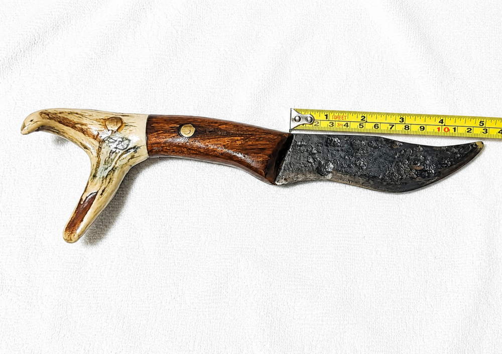 handmade hunting/skinning knife with an antler handle