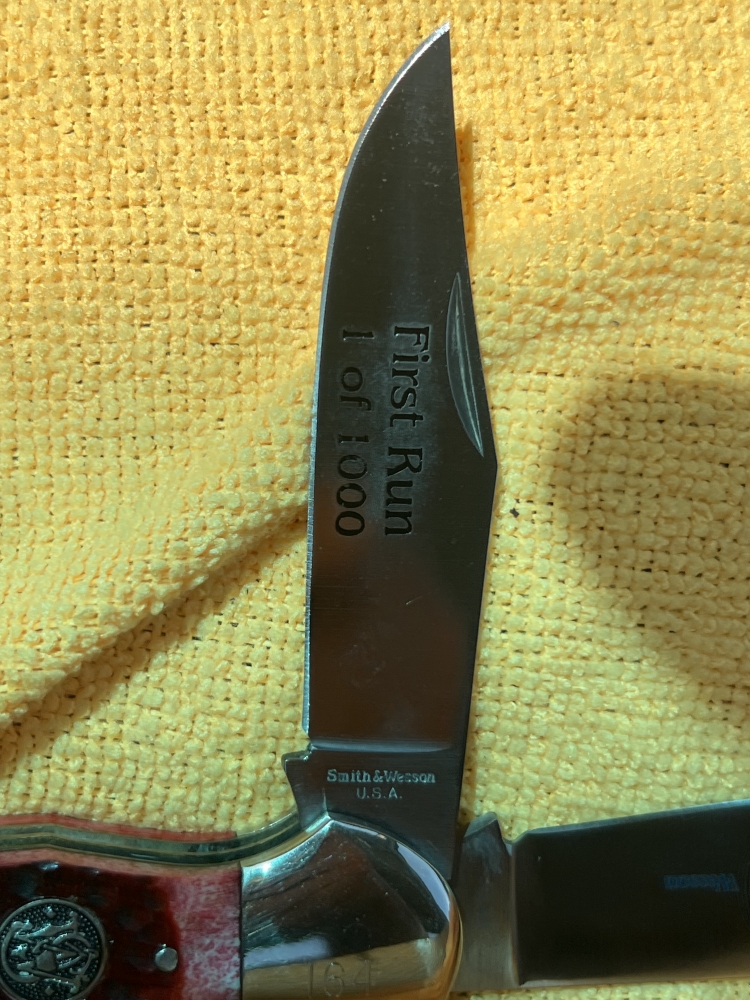 145th anniversary Smith & Wesson number 146 of 1000 old trapper large red stag handle