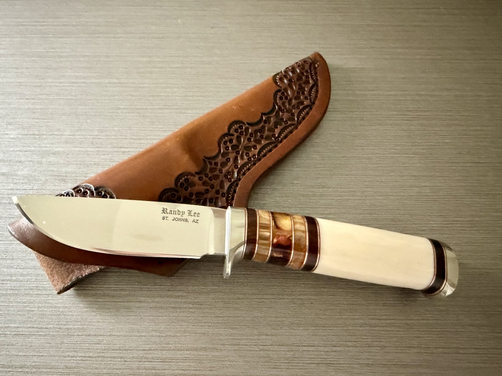 Randy Lee faux ivory hunter