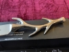New in box Selbrae  house antler cheese knife designed in Scotland.22cm overall length.5cm wide with a beautiful antler handle. It weighs 130g with a 11cm handle