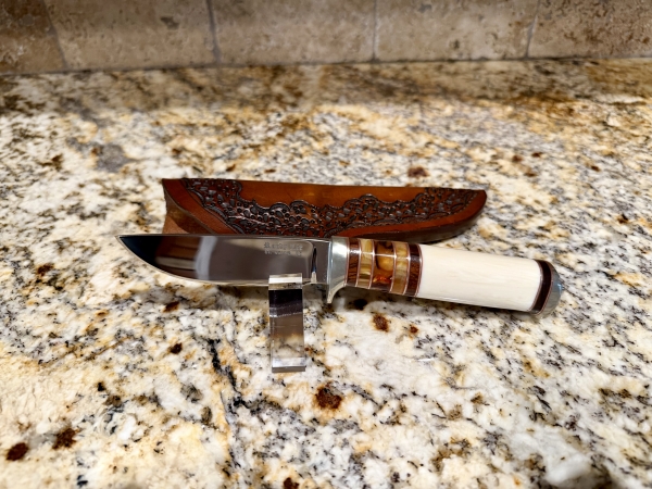 Randy Lee faux ivory hunter