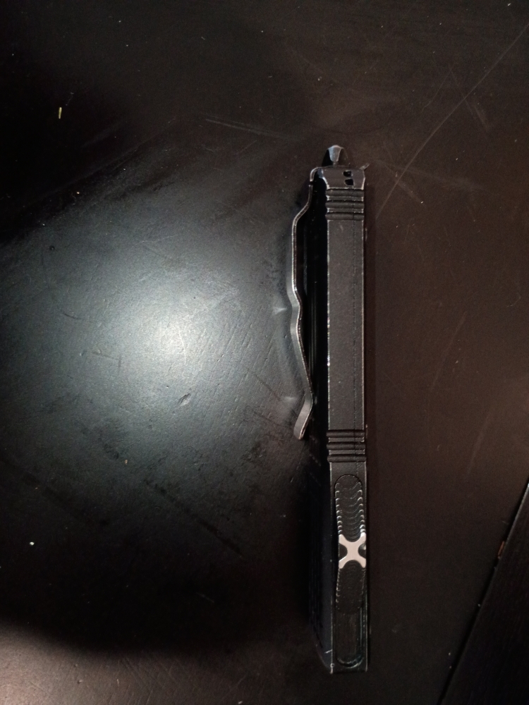AI Mode All Exact matches Visual matches About this image Search tools AI Overview    +1 This appears to be a Microtech Ultratech Signature Series \"Frag\" pattern automatic knife, manufactured in July 2020. It features a black frag-pattern handle and is sp