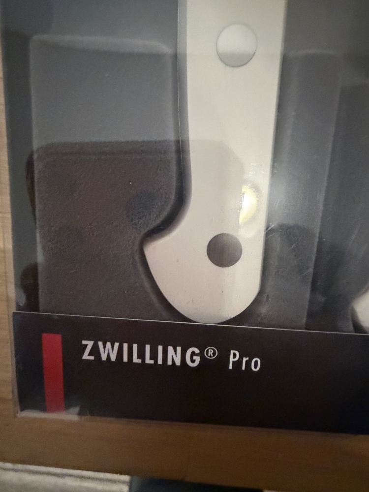 ZWILLING Pro 2-Piece Knife Set 7” Santoku & 5” Serrated Utility Knife White Hand