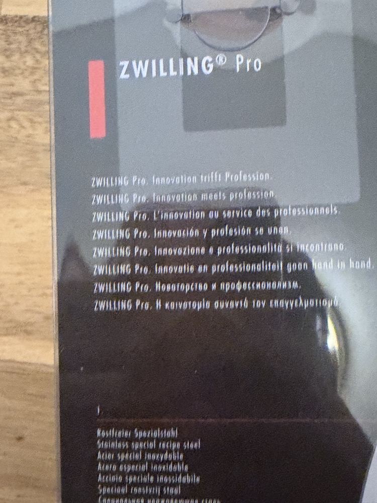 ZWILLING Pro 2-Piece Knife Set 7” Santoku & 5” Serrated Utility Knife White Hand
