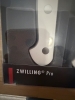 ZWILLING Pro 2-Piece Knife Set 7” Santoku & 5” Serrated Utility Knife White Hand