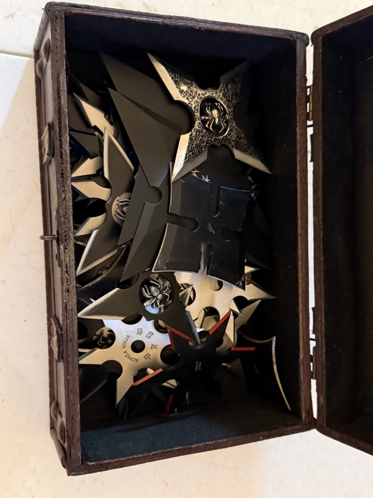 50 plus throwing stars in wood box