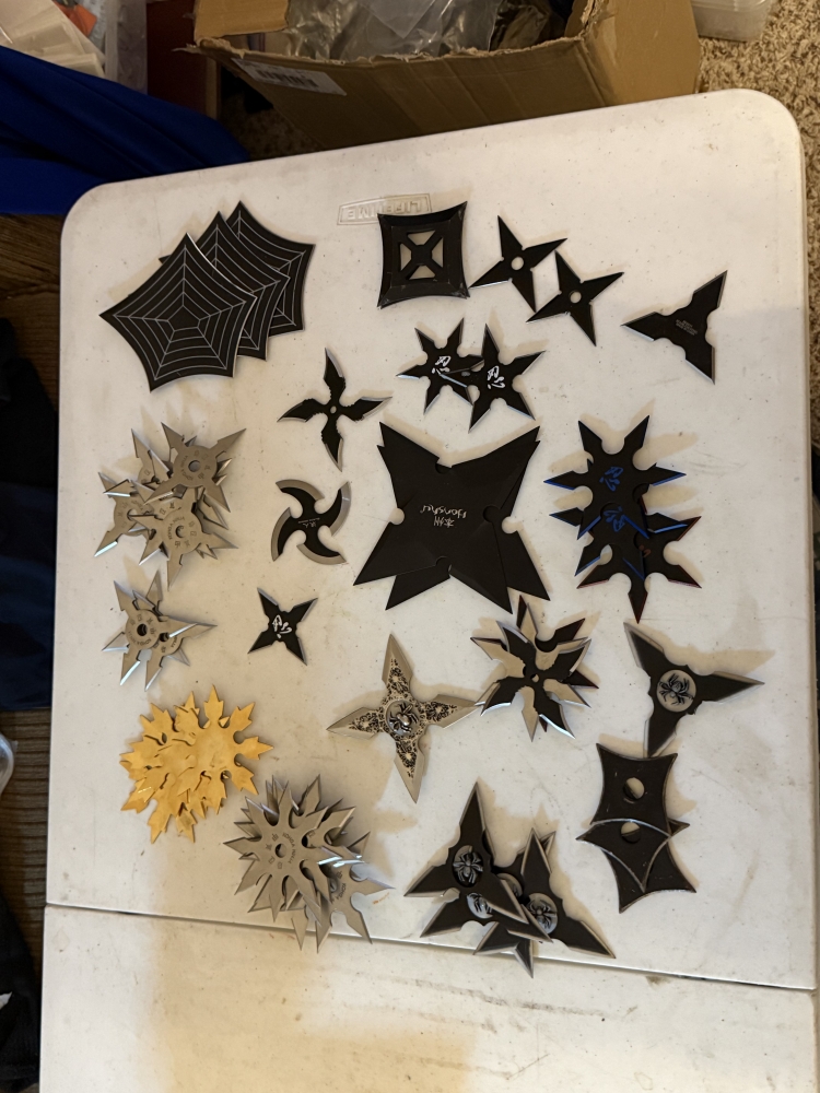 50 plus throwing stars in wood box