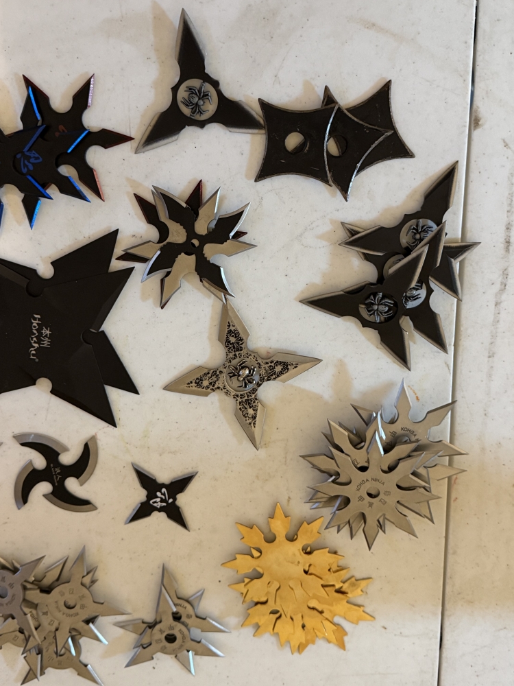50 plus throwing stars in wood box