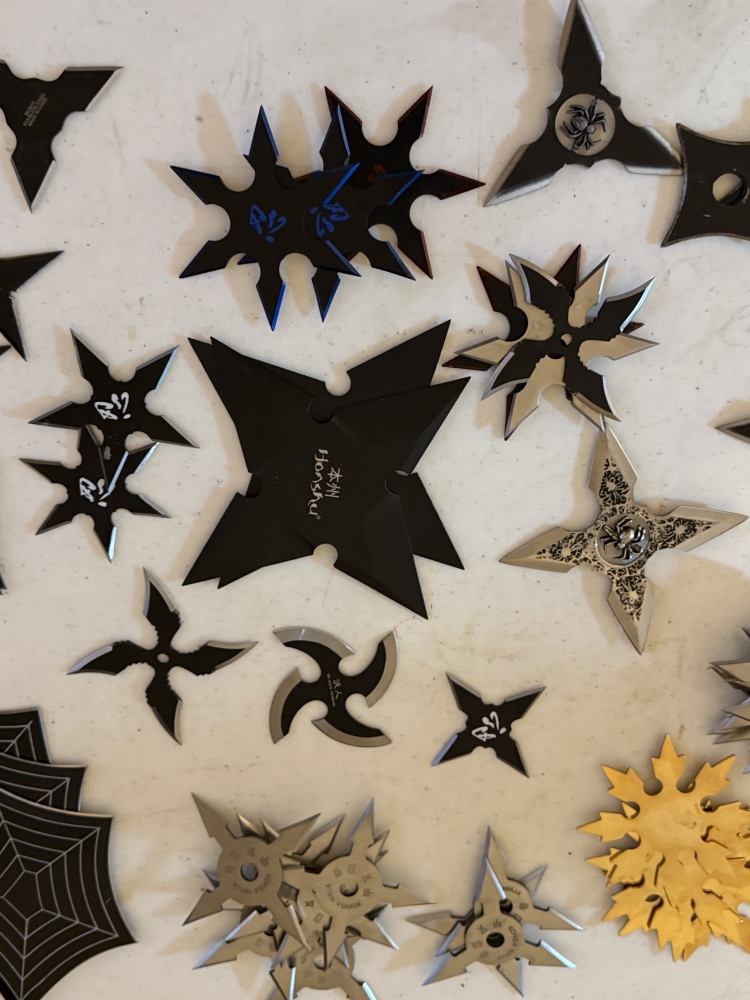 50 plus throwing stars in wood box