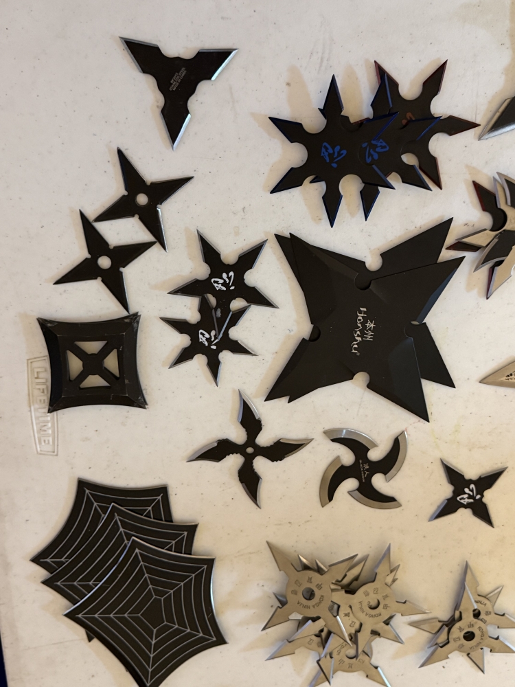 50 plus throwing stars in wood box