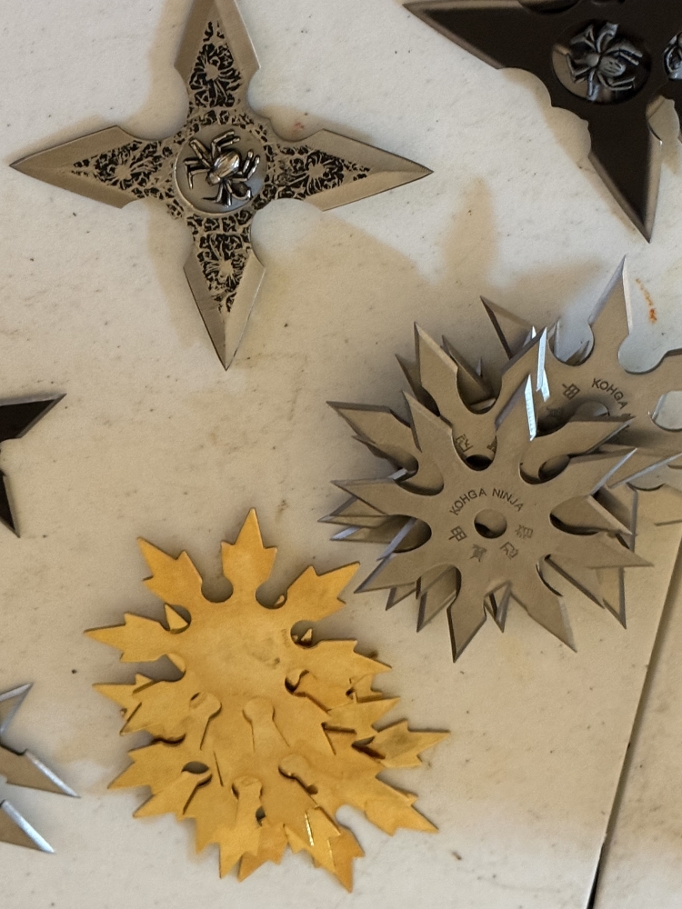 50 plus throwing stars in wood box