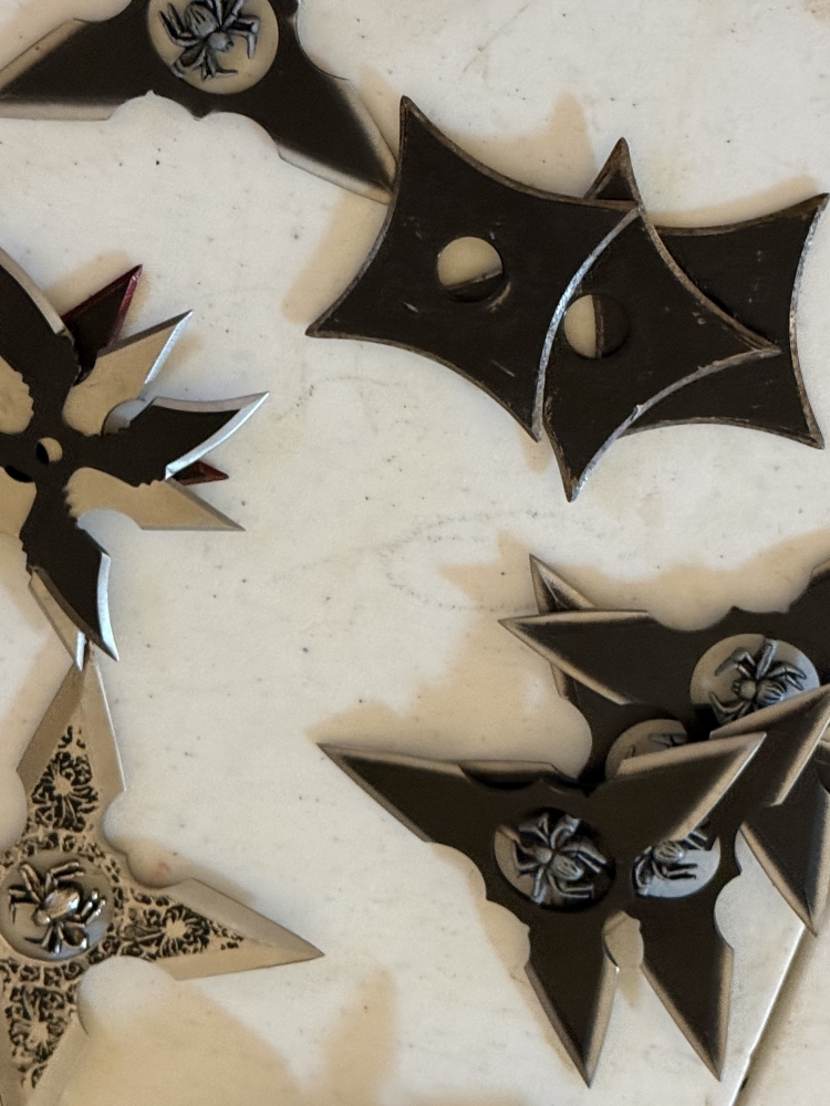 50 plus throwing stars in wood box