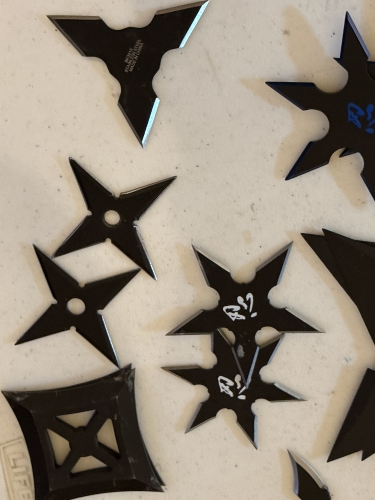 50 plus throwing stars in wood box