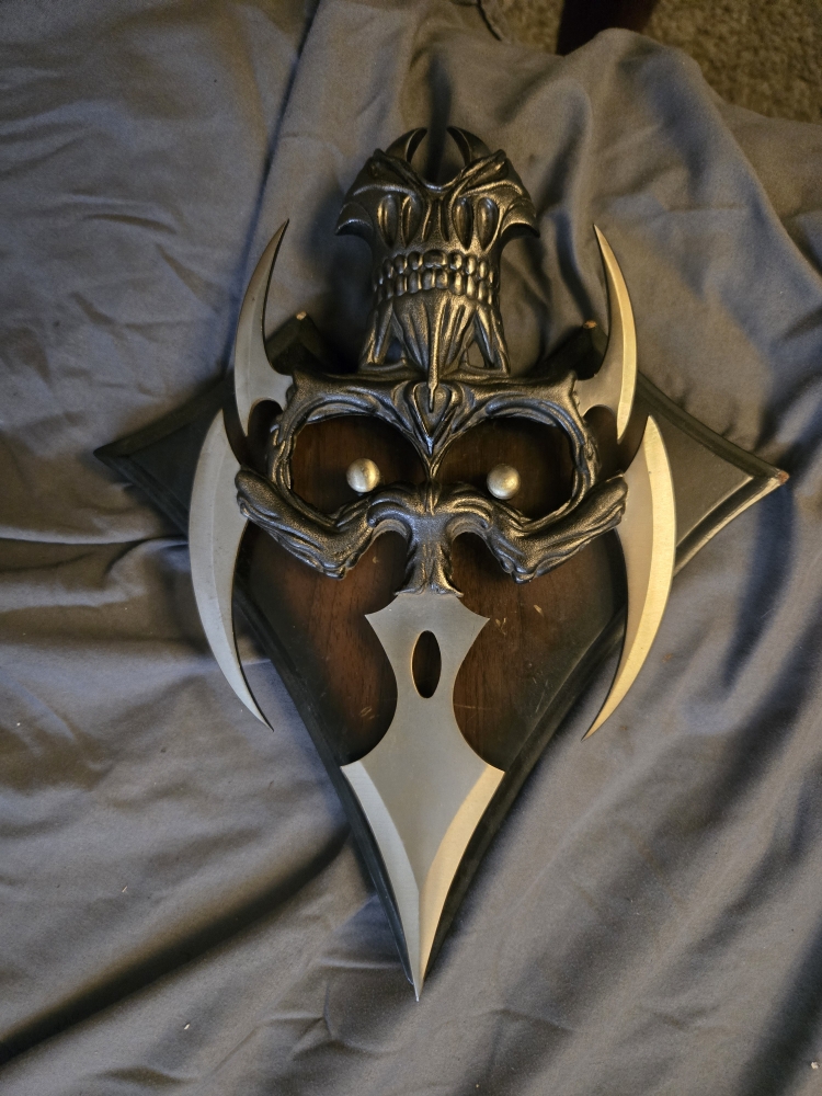 Cast iron skull hand claw