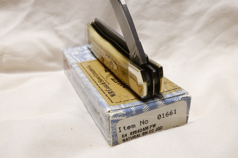 CASE TRAPPER with mellow Damascus blades and Natural Bone handles! Made in 2000! 