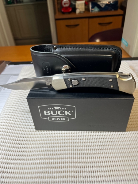 buck 110 auto w? sheath