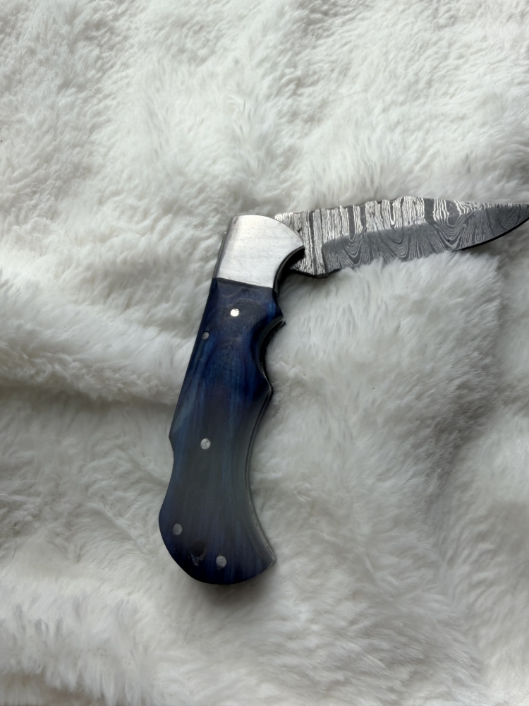 Handmade folding knife with belt pouch