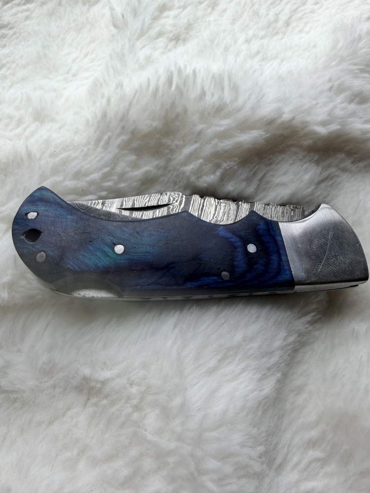 Handmade folding knife with belt pouch