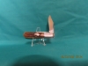 KA-BAR- (KNIFE COLLECTOR CLUB); \"DOG HEAD BARLOW\" or the KA-BAR-LO NIB w/ papers