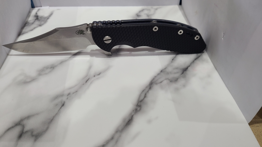 Hinderer XM-24 Bowie. Stonewashed blade with Blue titanium and Black G10 Scales.
