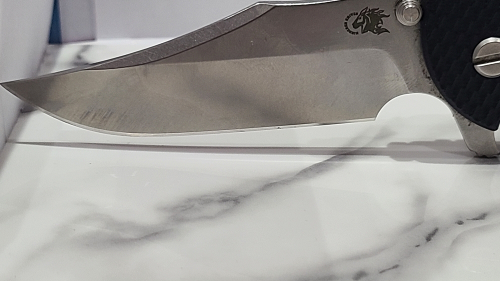 Hinderer XM-24 Bowie. Stonewashed blade with Blue titanium and Black G10 Scales.