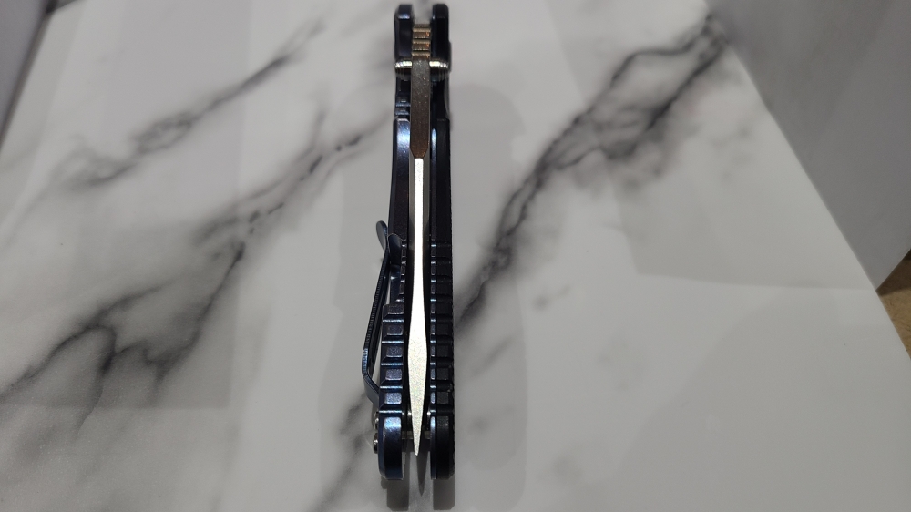 Hinderer XM-24 Bowie. Stonewashed blade with Blue titanium and Black G10 Scales.