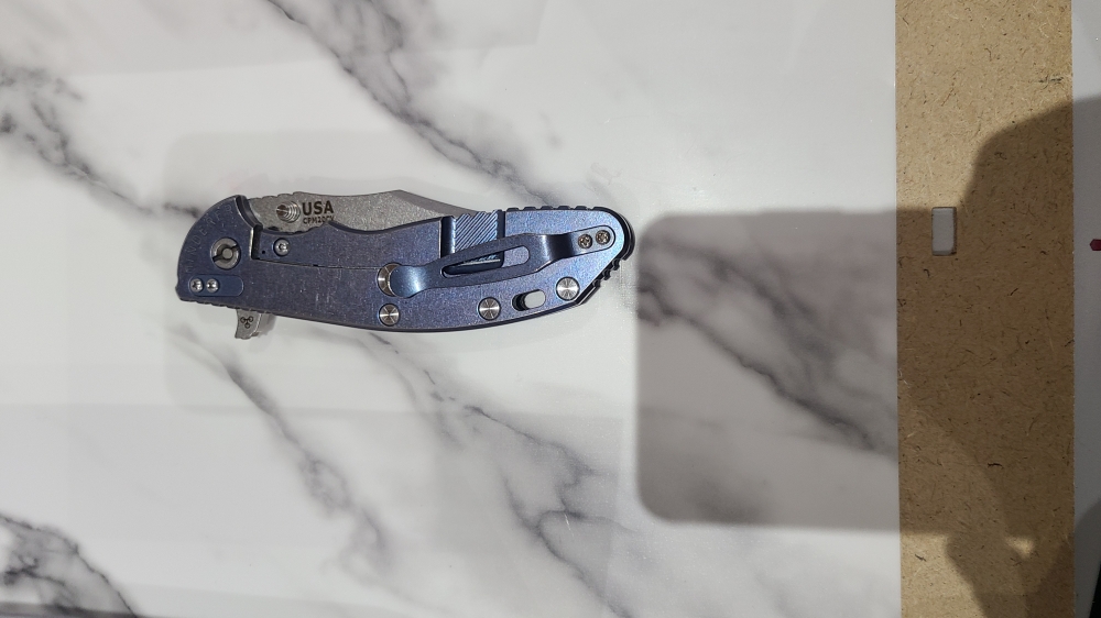 Hinderer XM-24 Bowie. Stonewashed blade with Blue titanium and Black G10 Scales.